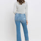 Mid Rise Frayed Hem Ankle Bootcut Jeans