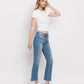 Mid Rise Distressed Hem Ankle Bootcut Jeans